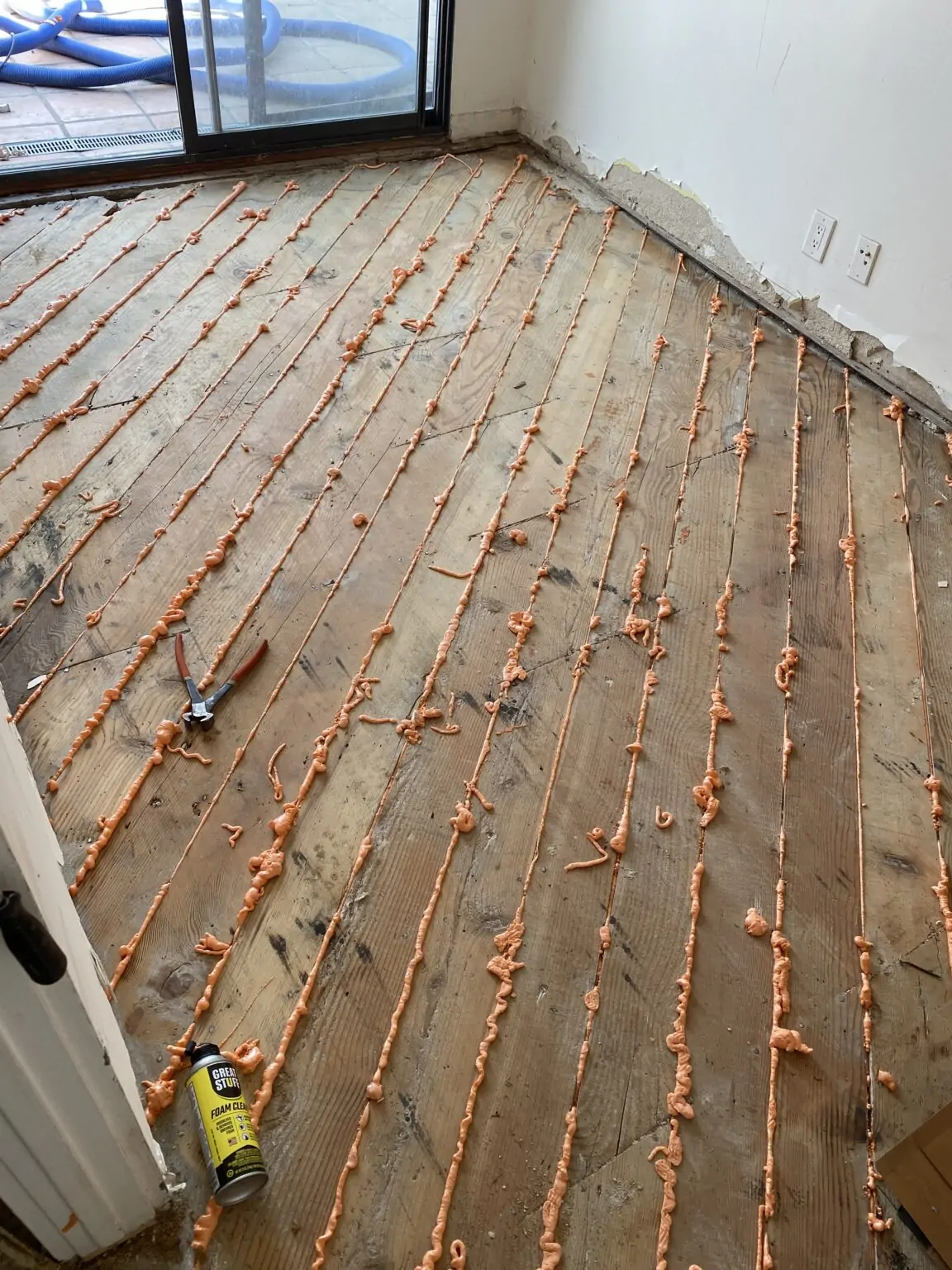 Previously coated subfloor still showing contamination