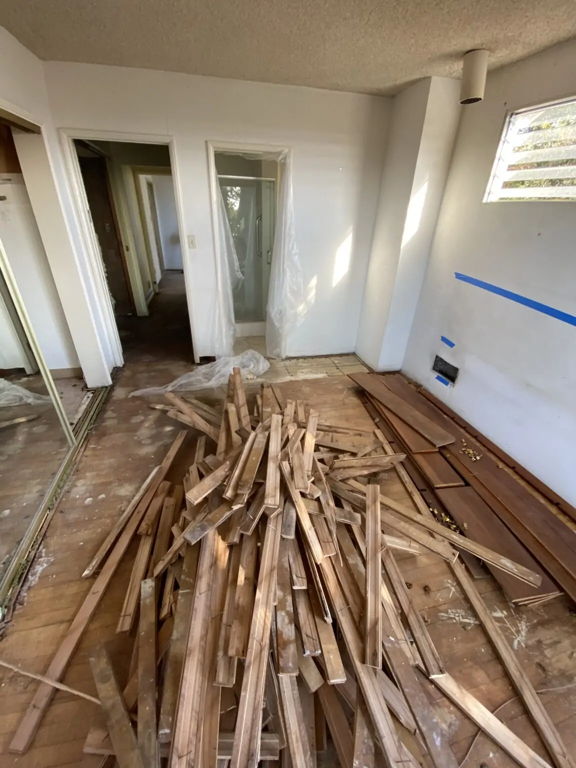 Framing and joists exposed after removing a contaminated subfloor section